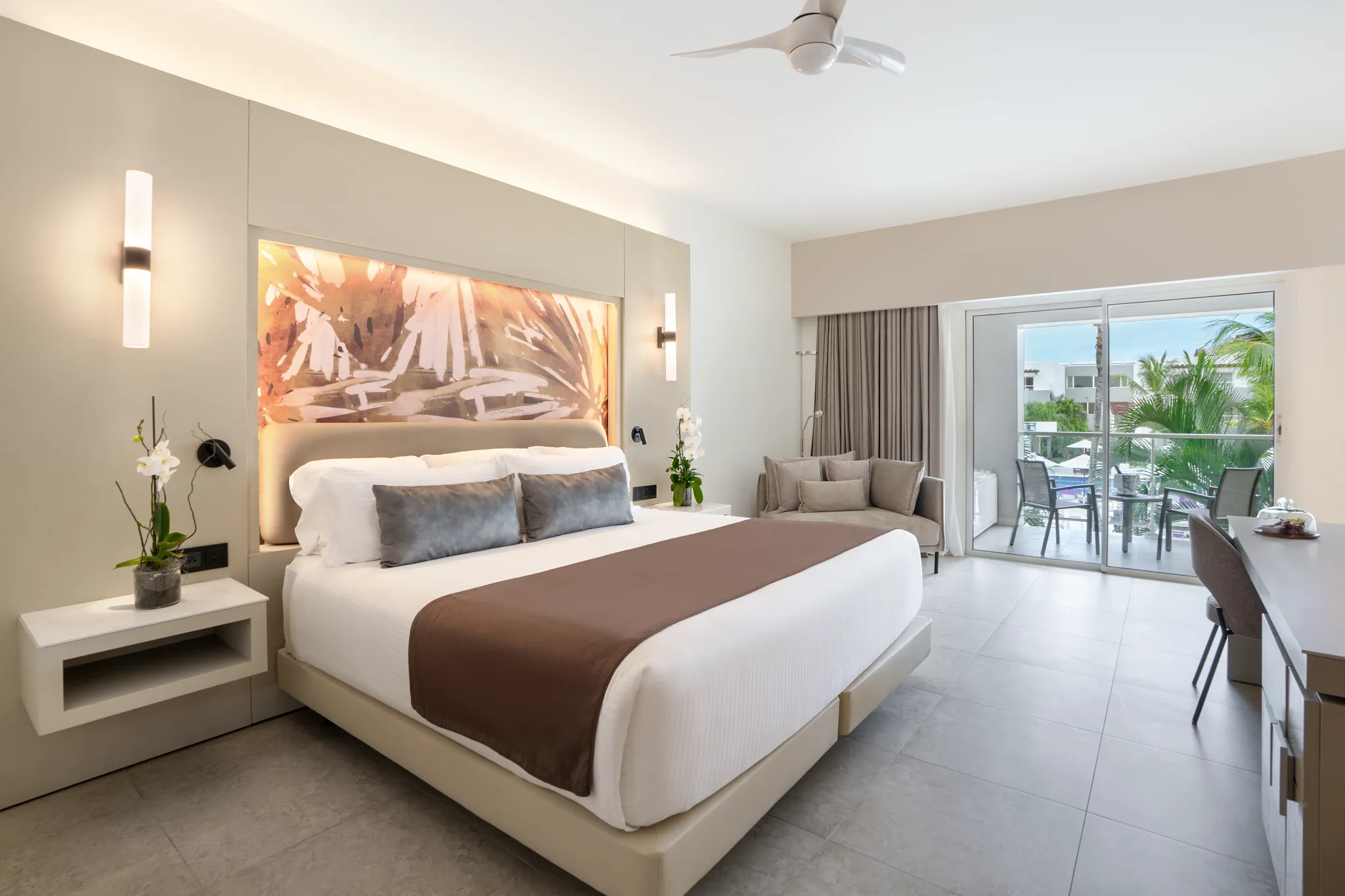 Allure Junior Suite Pool View with king bed and private balcony overlooking the pool at Breathless Punta Cana Resort.
