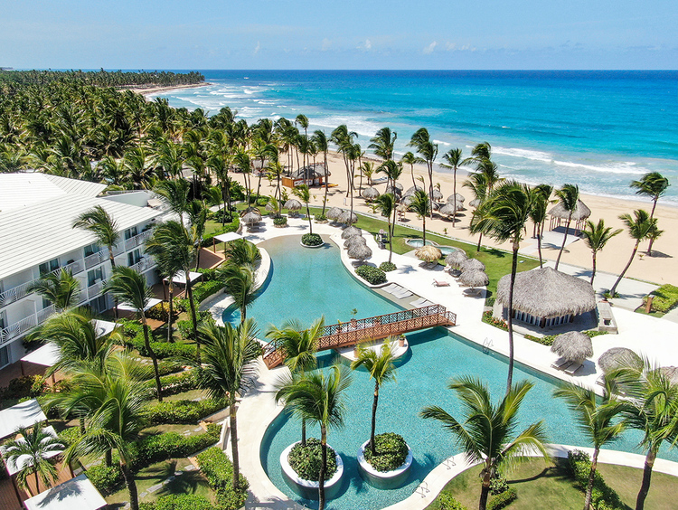 Excellence Punta Cana adults-only all-inclusive resort with beachfront suites and lagoon-style pools.