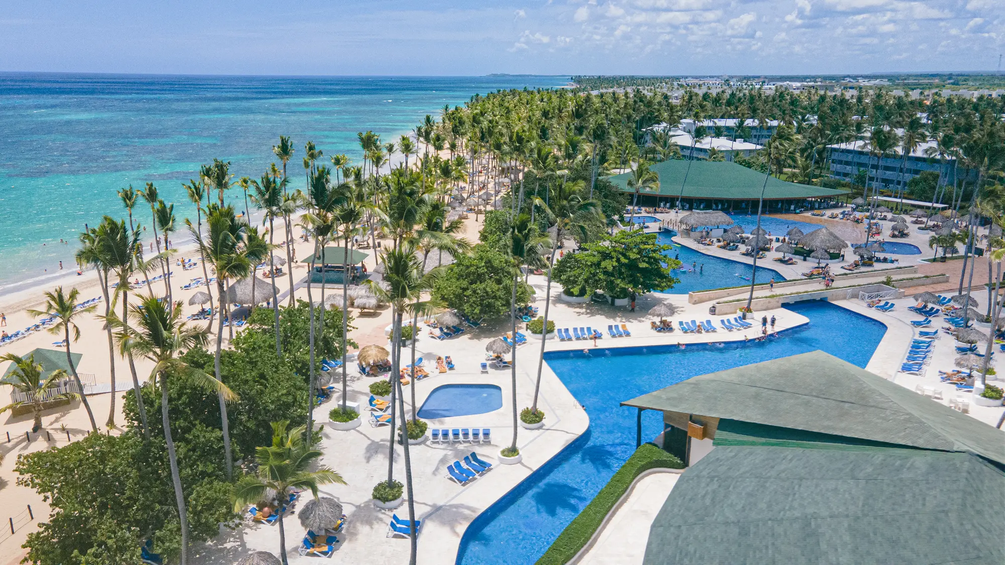 Grand Sirenis Punta Cana family-friendly all-inclusive resort with expansive pools, waterpark, and beachfront in Uvero Alto, Dominican Republic.