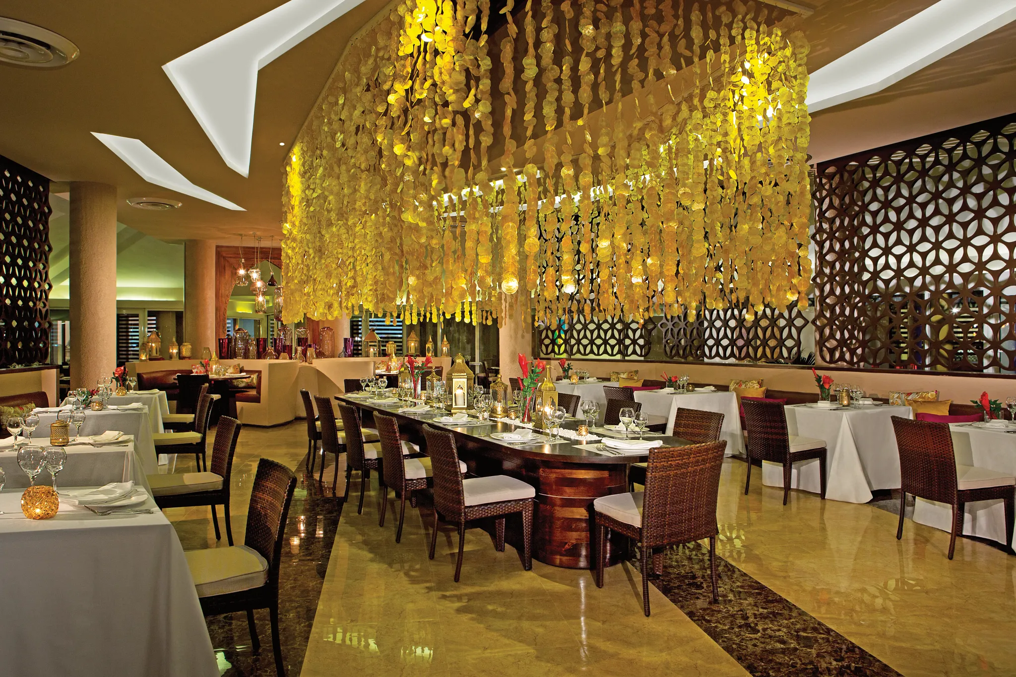 Kibbeh Middle Eastern and Mediterranean restaurant at Breathless Punta Cana featuring elegant dining tables, warm lighting, and a romantic upscale atmosphere.