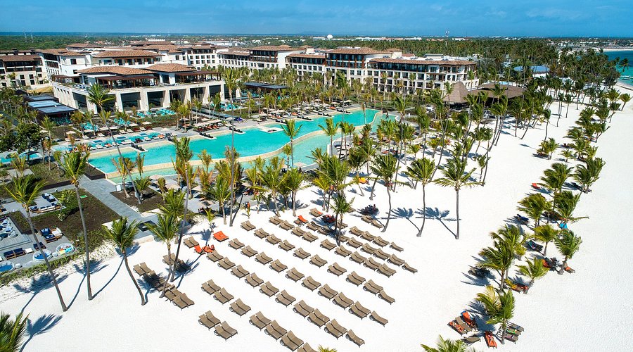 Lopesan Costa Bávaro Resort with large pools, casino, and modern beachfront design in Punta Cana.