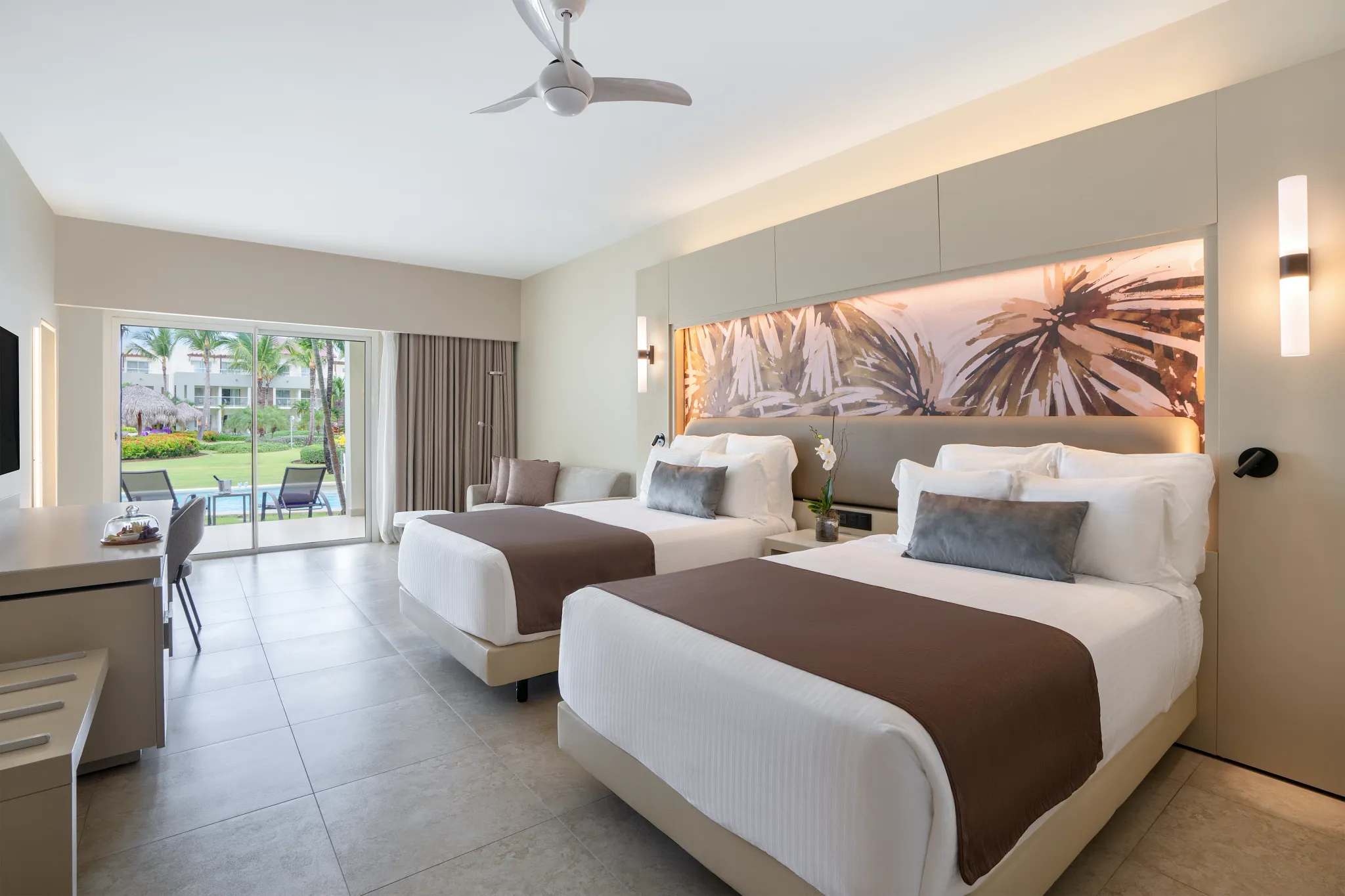 Xhale Club Junior Suite Swim Up with double beds and direct pool access at Breathless Punta Cana Resort.