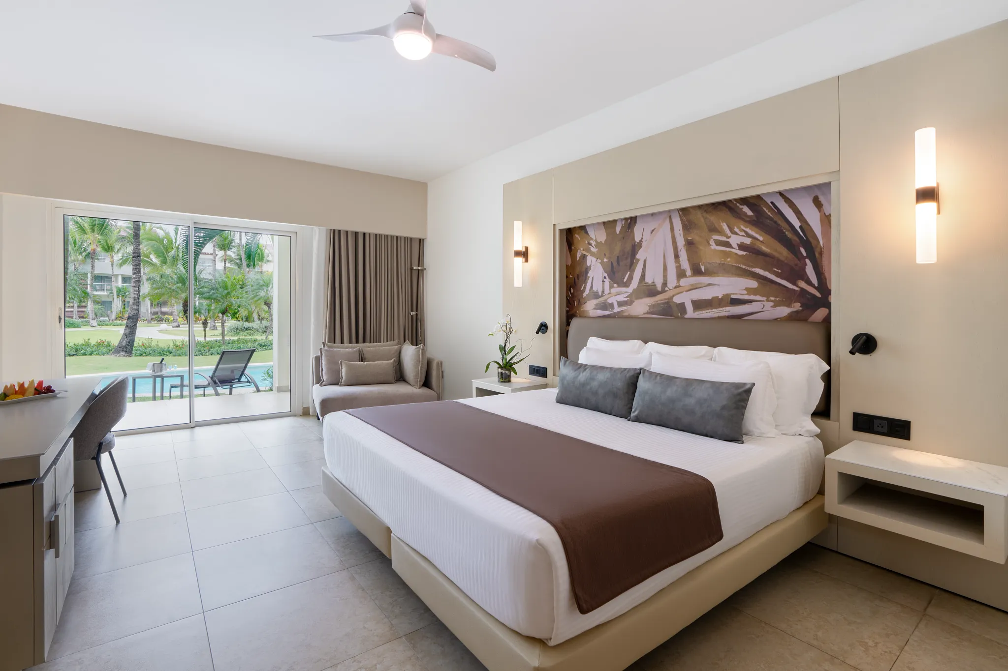 Xhale Club Junior Suite Swim Up with king bed and private terrace at Breathless Punta Cana Resort.