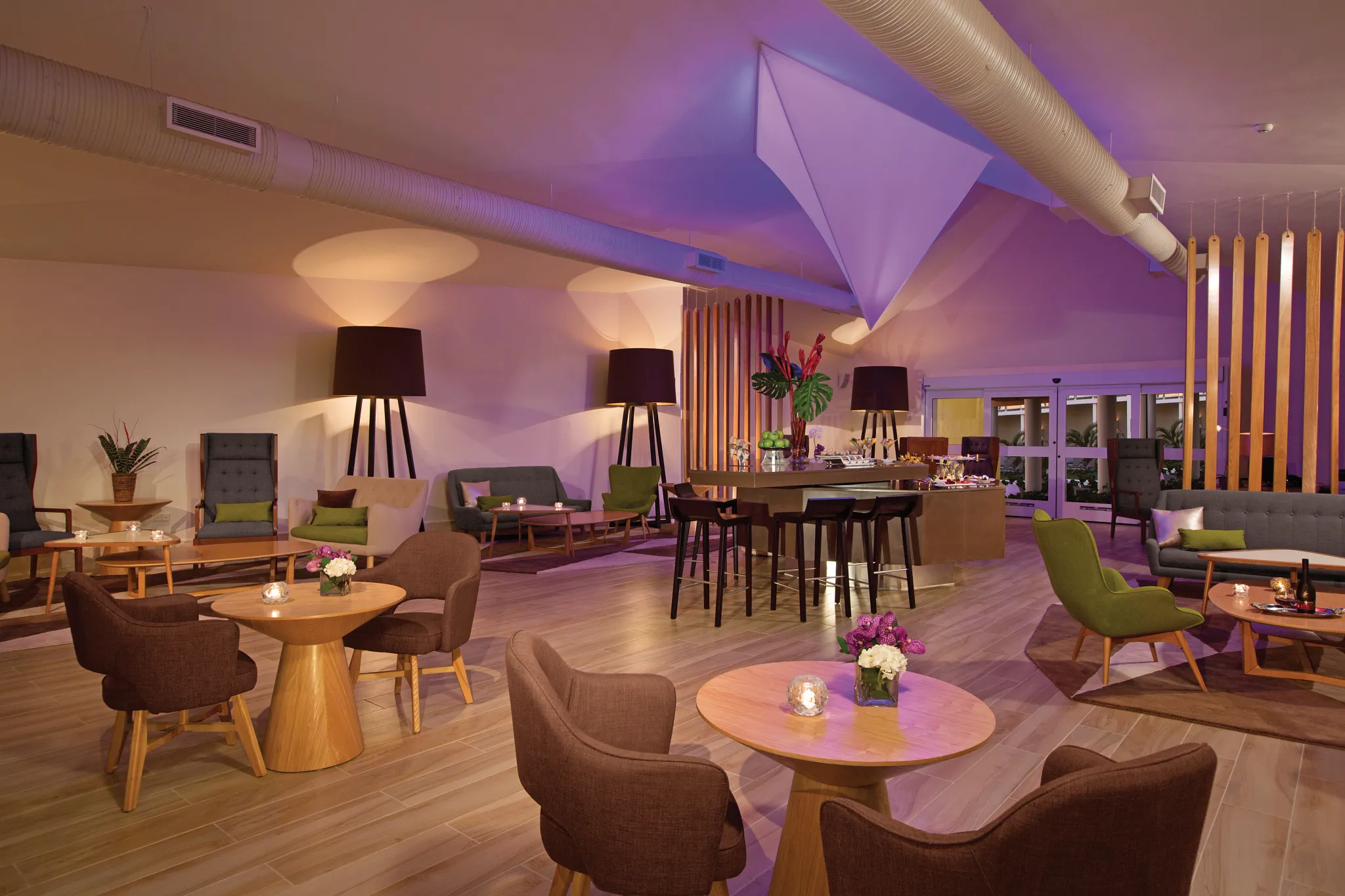 Modern xhale club lounge at Breathless Punta Cana featuring stylish seating, ambient lighting, and upscale social spaces.