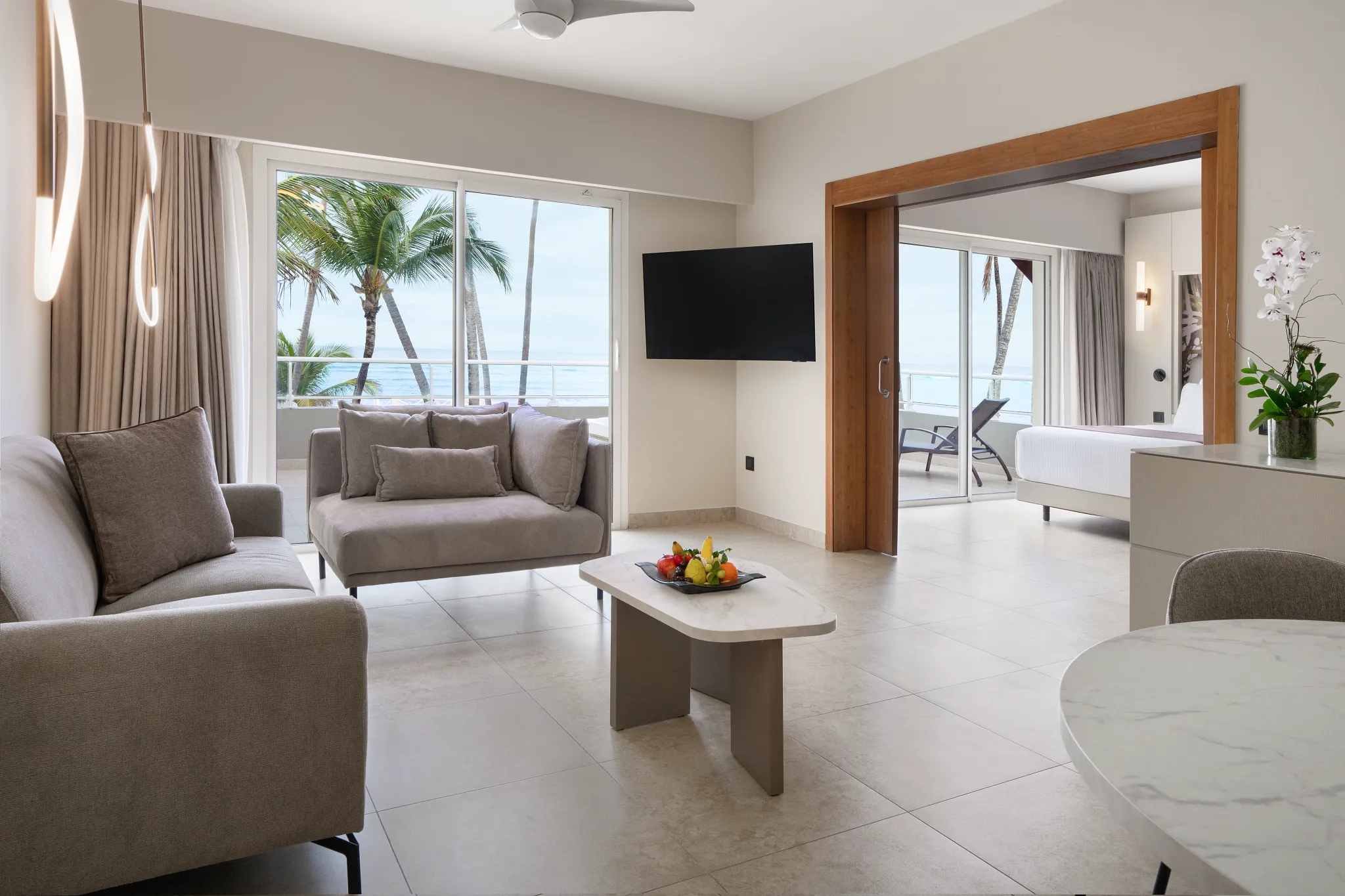Xhale Club Master Suite Ocean Front living area with seating and ocean views at Breathless Punta Cana Resort.